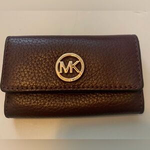 Michael Kor key holder wallet oxblood color